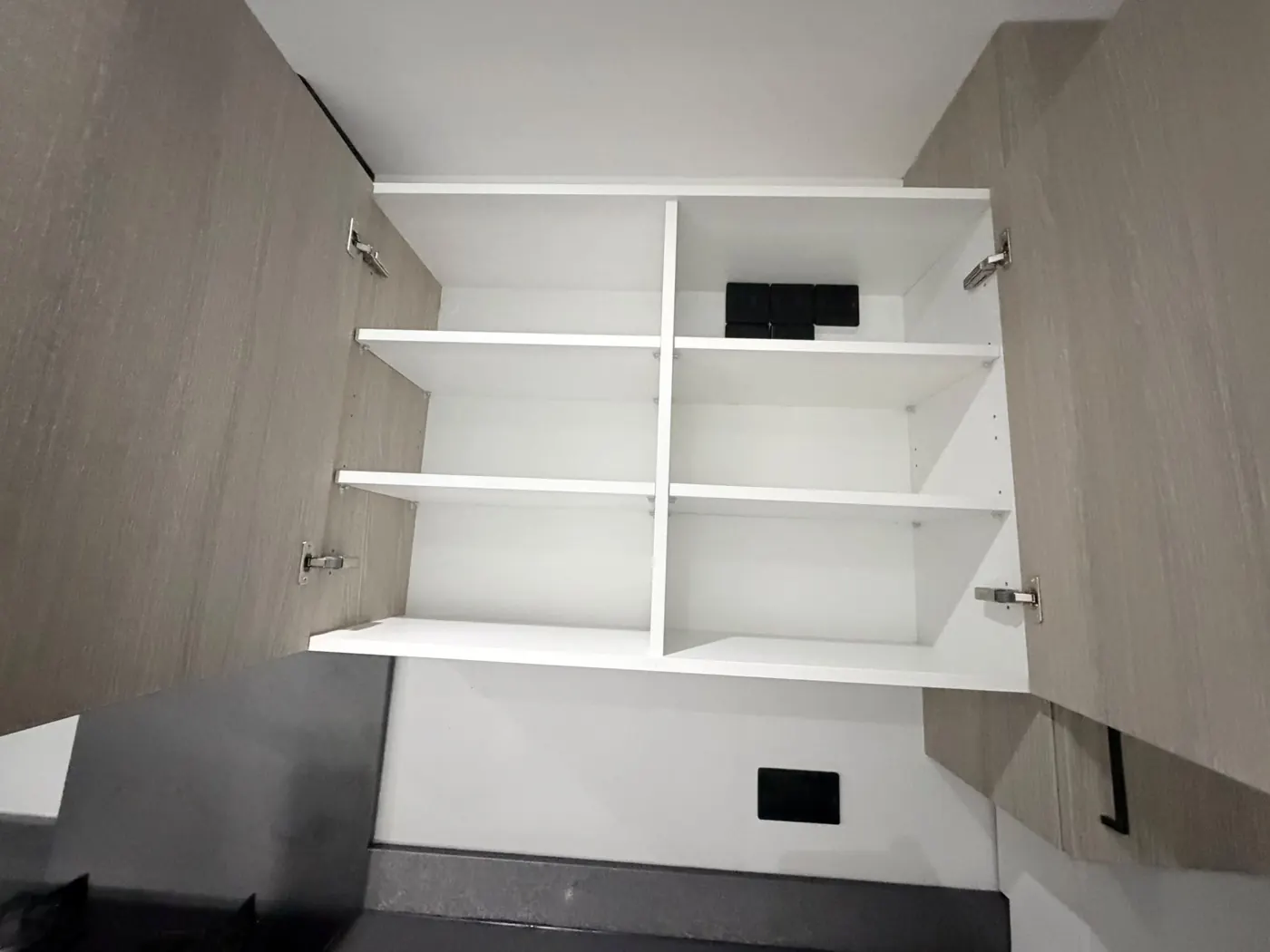 Inside the cupboards after cleaning by Golden Eye Cleaning